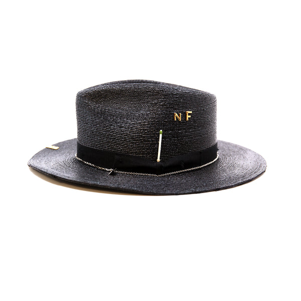 Numero 41  100% Mexican straw in Black  1" black herringbone band and bow with light distressing   NF Italian chain on base   Cartridge brass hat swag clip   NF jewelry pieces on crown   Woven in Mexico  Slight cowboy flanged brim  Made in USA