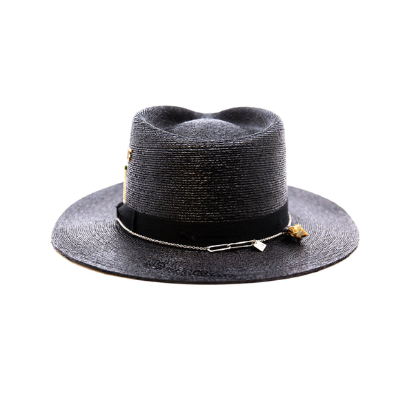 Numero 41  100% Mexican straw in Black  1" black herringbone band and bow with light distressing   NF Italian chain on base   Cartridge brass hat swag clip   NF jewelry pieces on crown   Woven in Mexico  Slight cowboy flanged brim  Made in USA