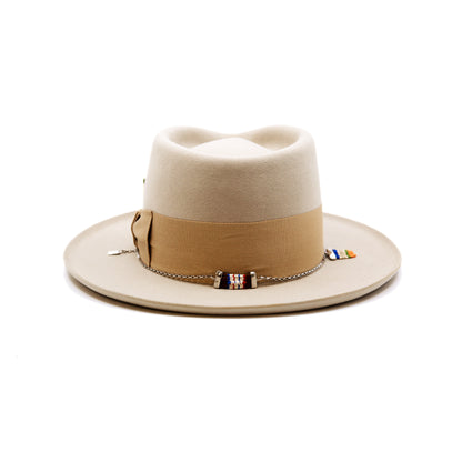St. Palais  100% felt hat in Sand  Western Weight  2" tonal herringbone band and bow   NF Italian chain on base  Slight pencil curled brim  Made in USA