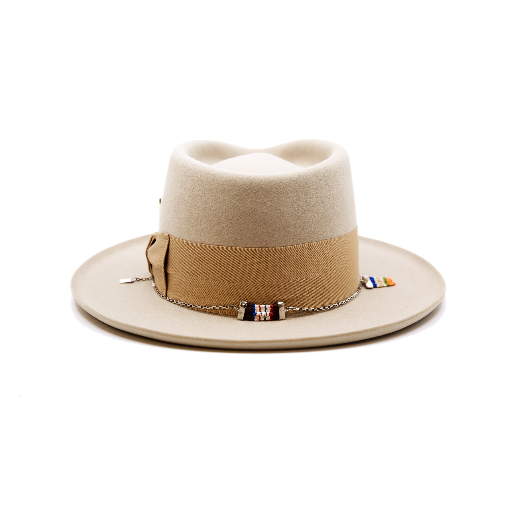 St. Palais  100% felt hat in Sand  Western Weight  2" tonal herringbone band and bow   NF Italian chain on base  Slight pencil curled brim  Made in USA