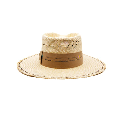 Mehari  100% Ecuadorian straw in Natural  Special NF Weave  2" tan herringbone band and bow   Custom NF iconography in band  Zig zag stitching on brim   Woven in Ecuador  Frayed brim  Made in USA