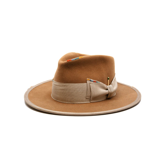 Phare Ouest  100% felt hat in Café Latte  Western Weight  2" tonal grosgrain band and double bow   Multi color handmade whip stitching throughout    Full binding  Flat brim  Made in USA