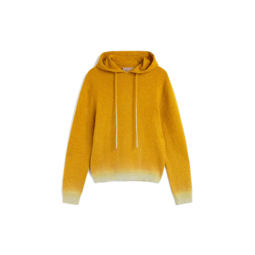 Nick Fouquet’s yellow Turi sweater made from wool and cashmere elevates the hoodie with a dip dyed ombre hem.  Yellow mid-weight cashmere wool hooded sweater Dip-dyed ribbed hem in cream Dip-dyed knit drawstrings at hood Composition: 90% virgin wool, 10% cashmere. Dry clean Country of origin: Italy